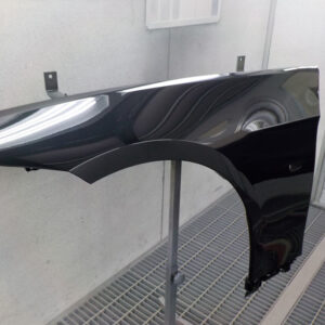 This BMW left front guard is ready to be put on the car after being sprayed in the oven.